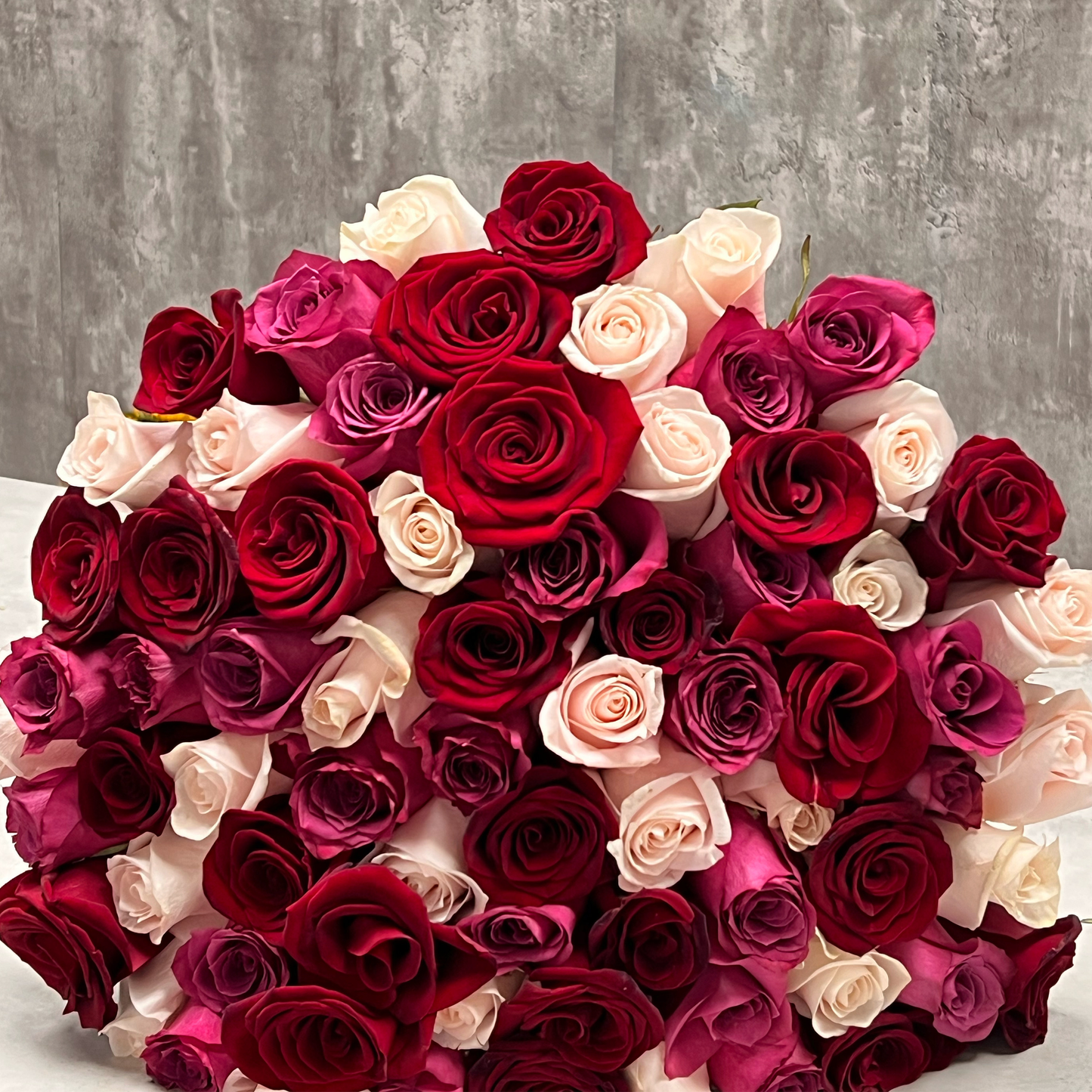 A breathtaking arrangement of pink, red, and white long-stemmed roses, symbolizing love and passion. Perfect for Valentine's Day, available for local delivery in Miami, FL, and nationwide shipping. Up to 50 roses for a grand gesture of affection. Select February 13 for faster delivery. Limited stock - order now for a truly memorable celebration